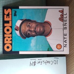 (A) 1986 Topps #521 Orioles Natr Snell